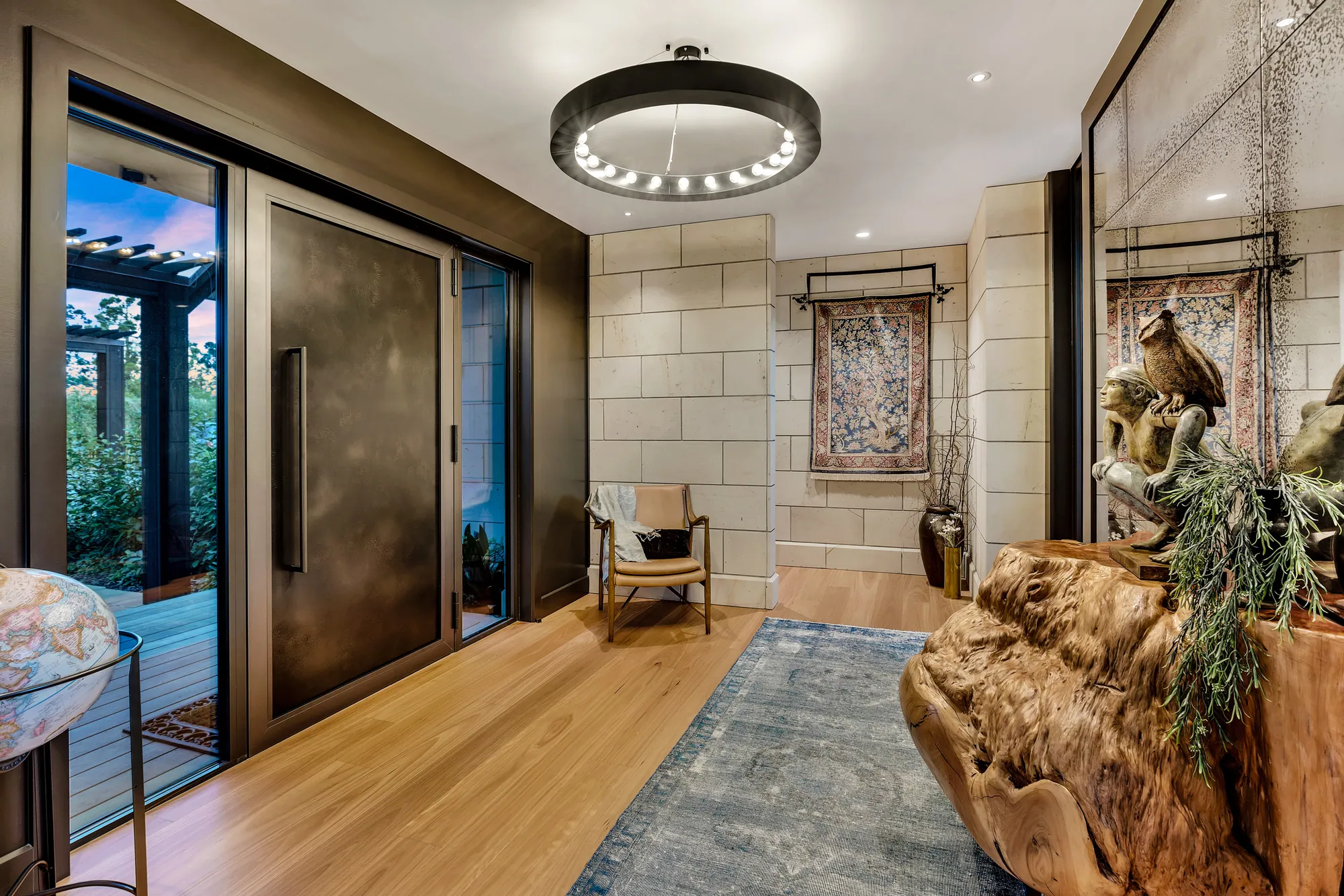 The living space of a completed Cogan home opening to the water
