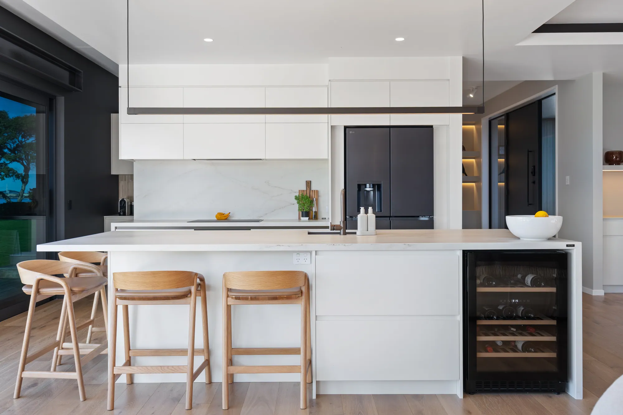 The showhome kitchen, with integrated joinery and stone benchtops
